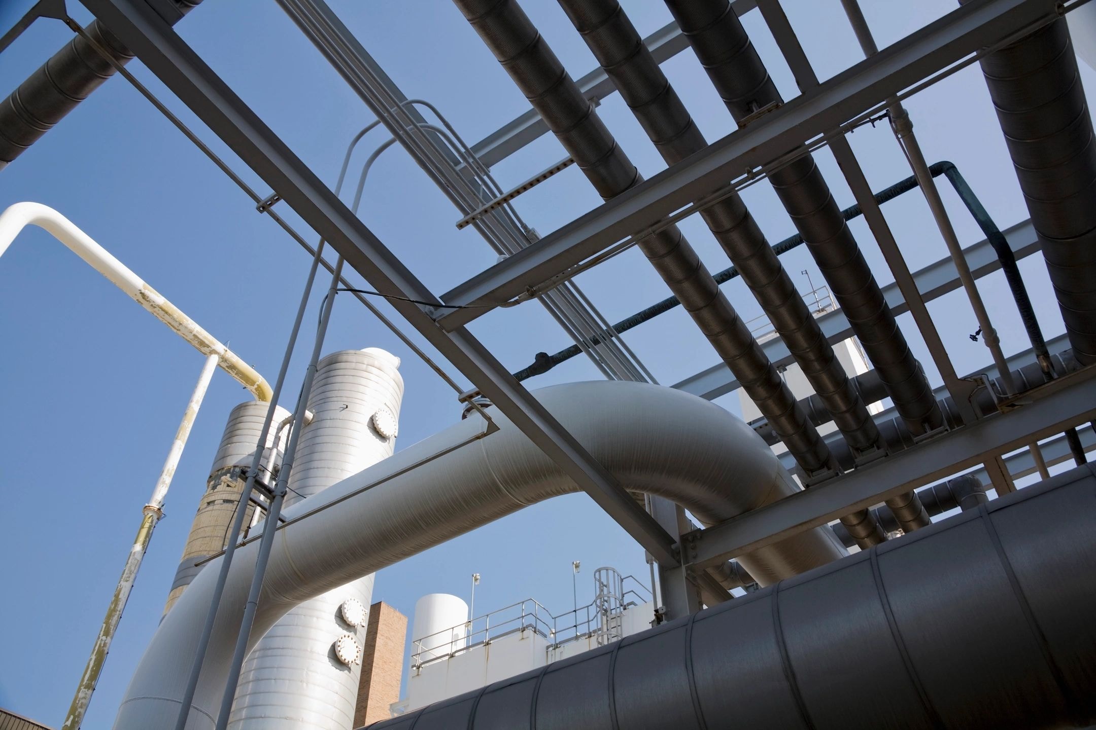 Industrial processing facility with tanks and piping